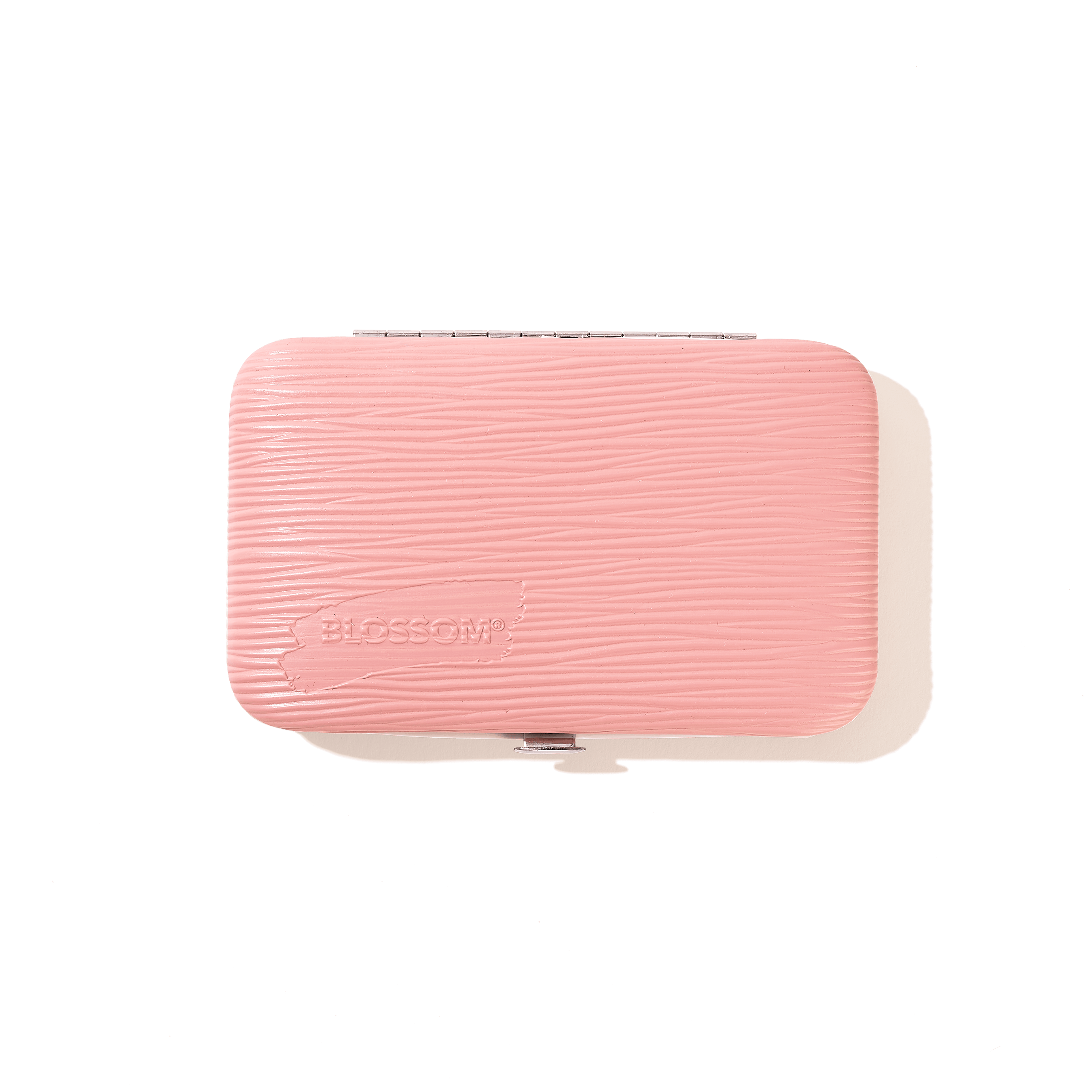 Blossom hard-shelled pink nail case 10-piece kit  includes nail clippers, nail scissors, cuticle trimmer, tweezers, nail file, push stick, and more.  