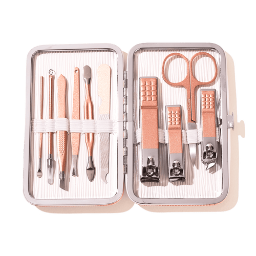 Blossom Pink 10-piece Nail Kit includes nail clippers, nail scissors, cuticle trimmer, tweezers, nail file, push stick, and more.  